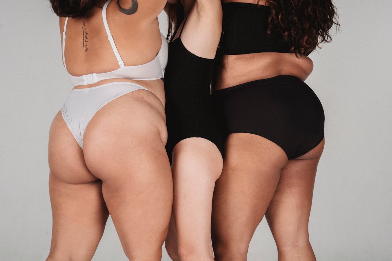 about-02 Embrace body positivity and diversity with this studio shot of women in lingerie, promoting self-love and acceptance.